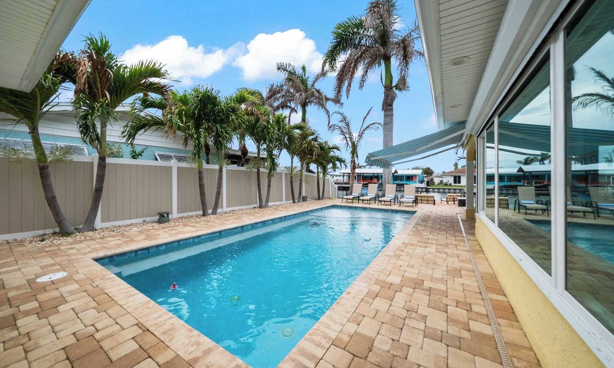 Venetian Way House | 3BR Waterfront Home with Pool & Kayaks