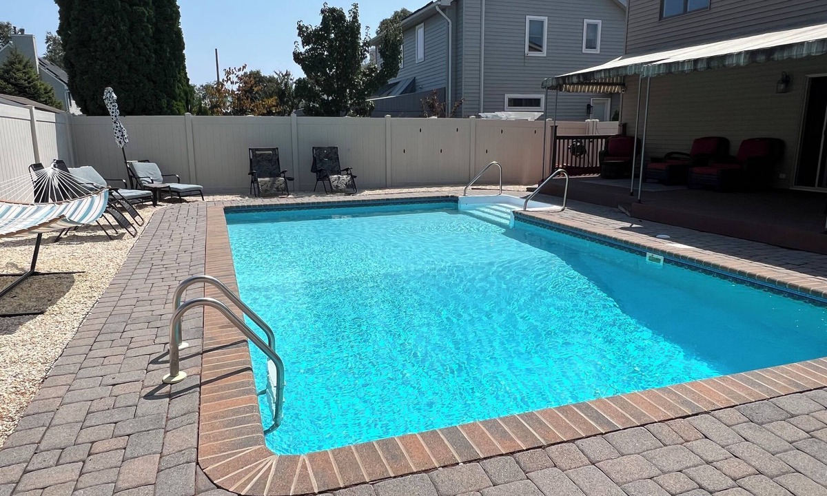 Avon House | 4 Bedroom, 3 Bath with Heated Pool + Hot Tub short walk to beach