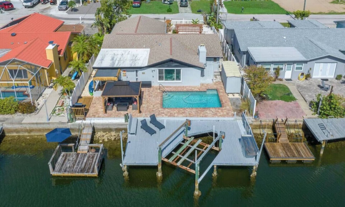 Hudson Beach Estates House | 4BR Waterfront | Boat Dock + Pool | 11-Min Walk to Beach | Sleeps 8
