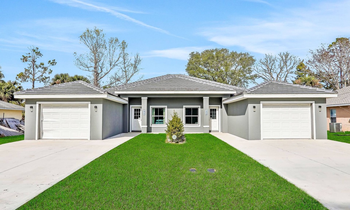 Palm Coast House | All-new duplex with screened pool, furnished lanai, grill, AC, & washer/dryer