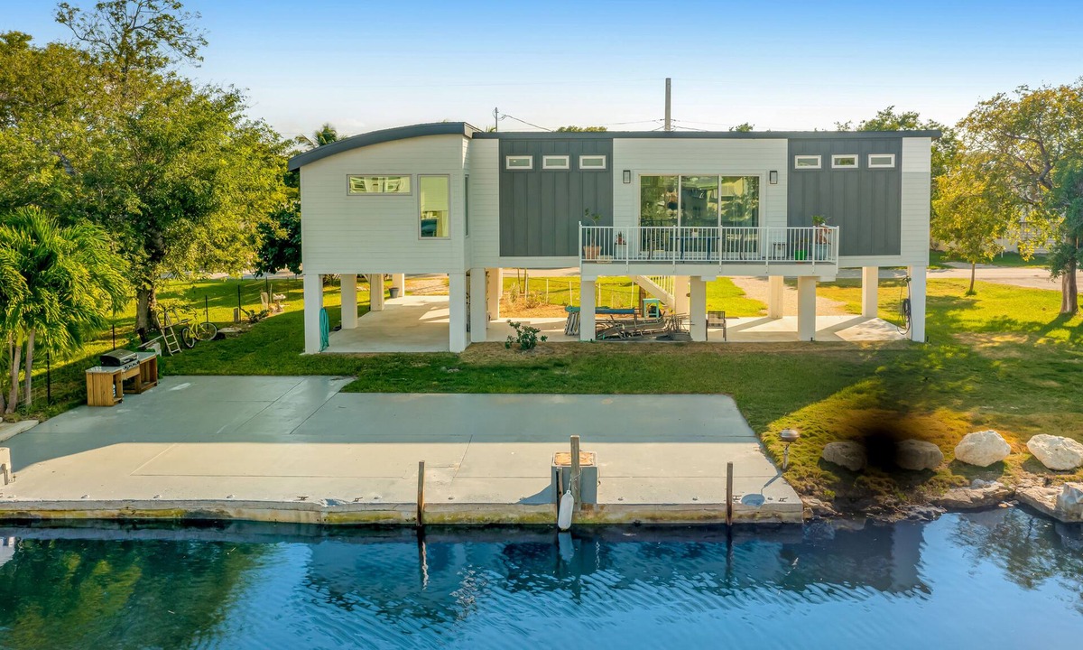 Doctor's Arm House | Beautiful waterfront home with central AC, dock, lovely balcony & patio