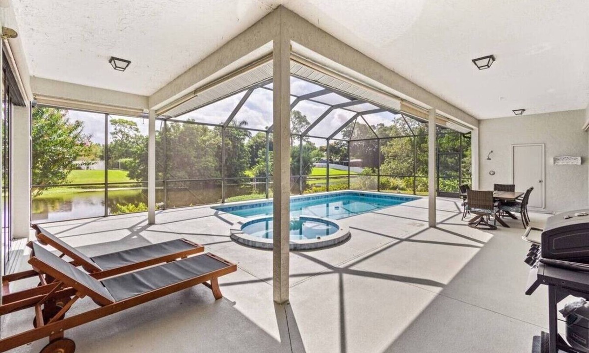 Palma Sola House | Bradenton Canal Home w/Private Pool, Hot Tub, Pac-Man Arcade & Canal Fishing
