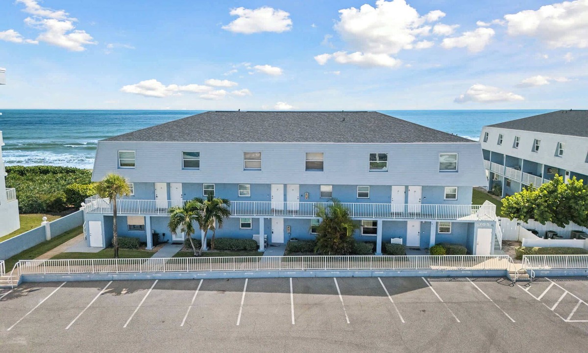 South Patrick Shores Condo | Bright Cozy Condo with Pool & Stunning Ocean Views