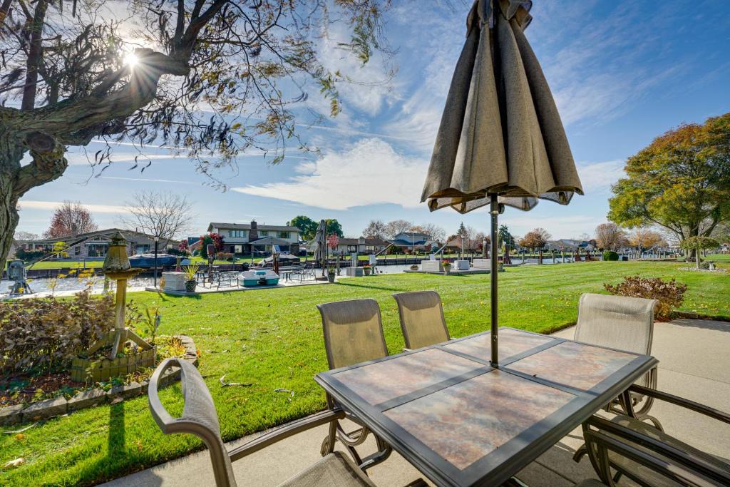 Pearl Beach House | Canal-Front Clay Township Gem Boat and Jet Ski Lift