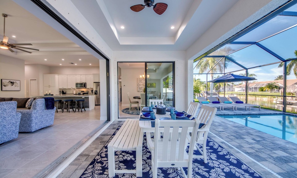 Pelican Villa | Cape Paradise - Magnificent 4 BR Villa with heated saltwater pool, kayaks, bikes, and fishing poles
