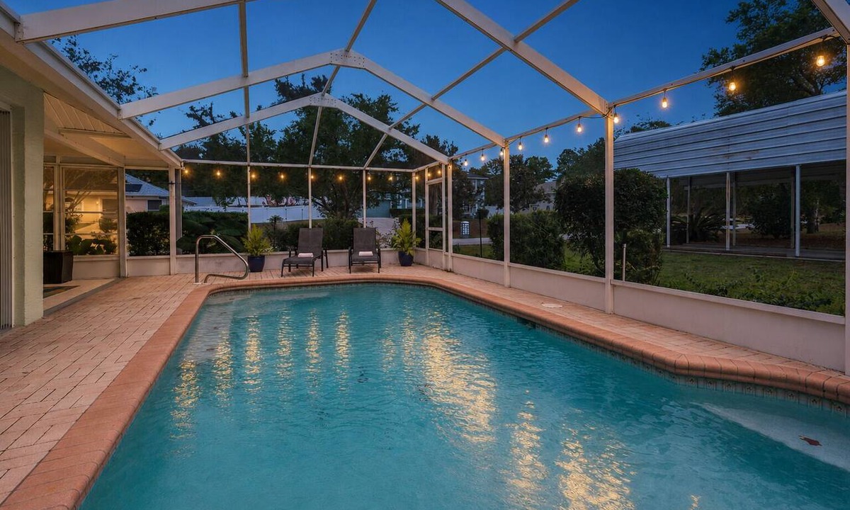 Spring Hill House | Clean, spacious home with heated pool near Weeki Wachi Springs!