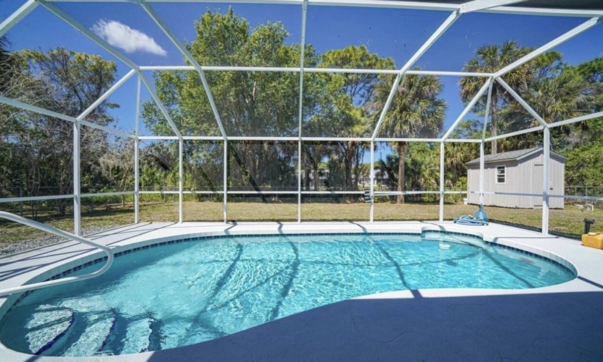 Port Charlotte House | Double Lot Canal Front Ranch- KING Bed -Heated Pool Near Warm Mineral Springs