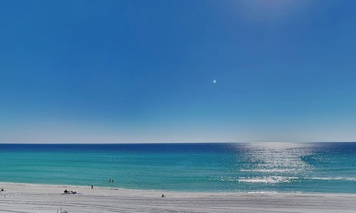 Crystal Beach Condo | Dunes of Crystal Beach 302 | large balcony, beach + pool access
