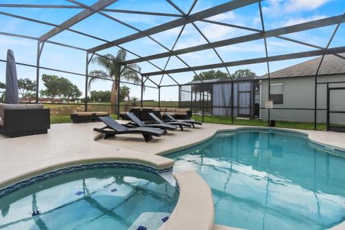 Windwood Bay House | Elegant Pool Escape in Windwood Bay