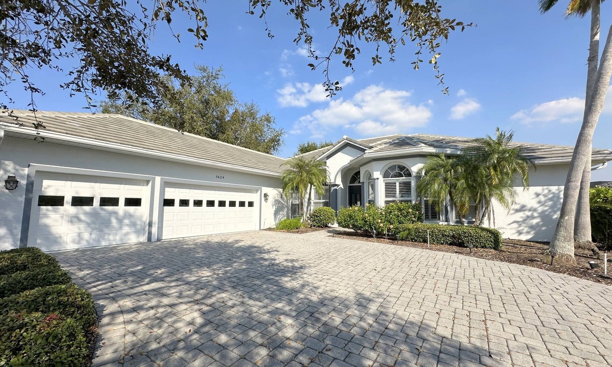 Riverwood House | Elegant Port Charlotte Oasis: 3BR/3BA Home with Private Heated Pool & Pond View