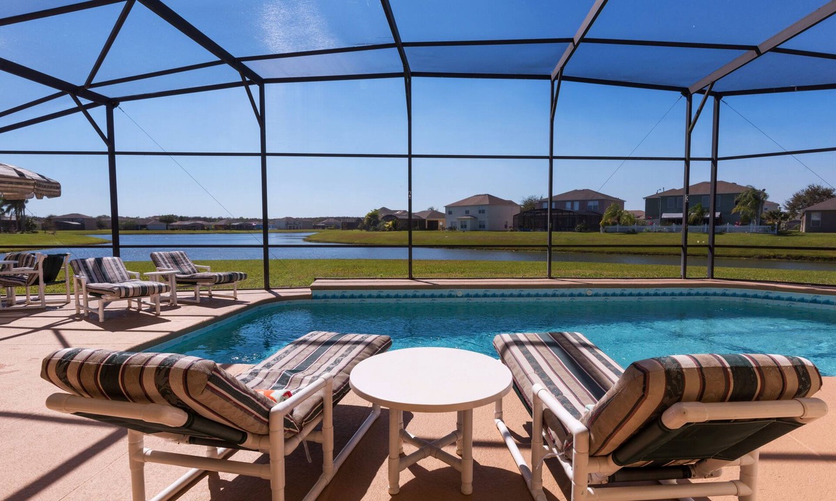 Crescent Lakes Villa | Executive 4 bed 3 bath villa, lake view, large pool, spa, 30 mins from Disney.
