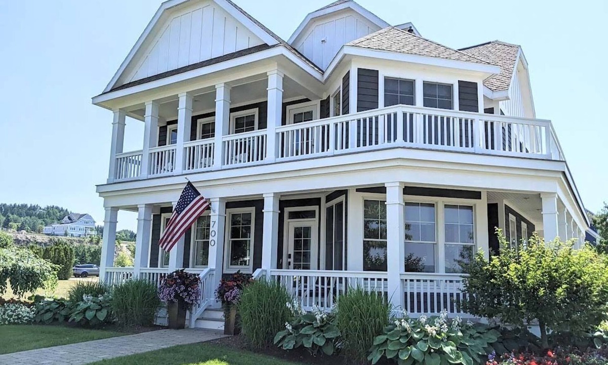 Bay Harbor House | Experience luxury in this 4-bedroom home with stunning lake views in Bay Harbor.
