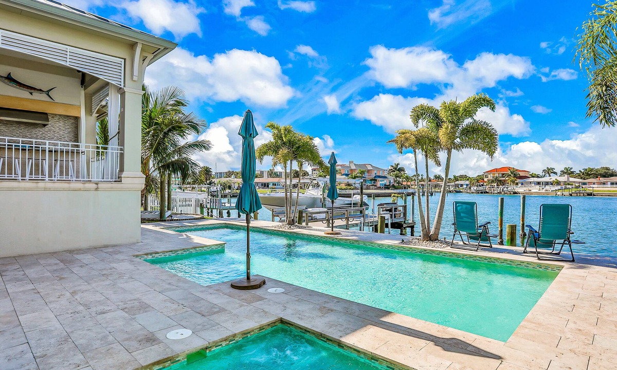 Island Estate House | Exquisite Clearwater Retreat w/Heated Pool, Game Room, Outdoor kitchen &Kayaks