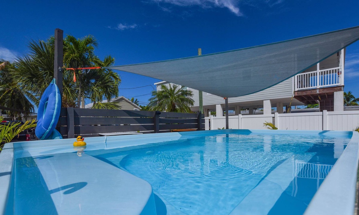 Big Coppitt Key House | Have It All! Pool, Canal to the Gulf, Tiki Hut & Huge Dock.