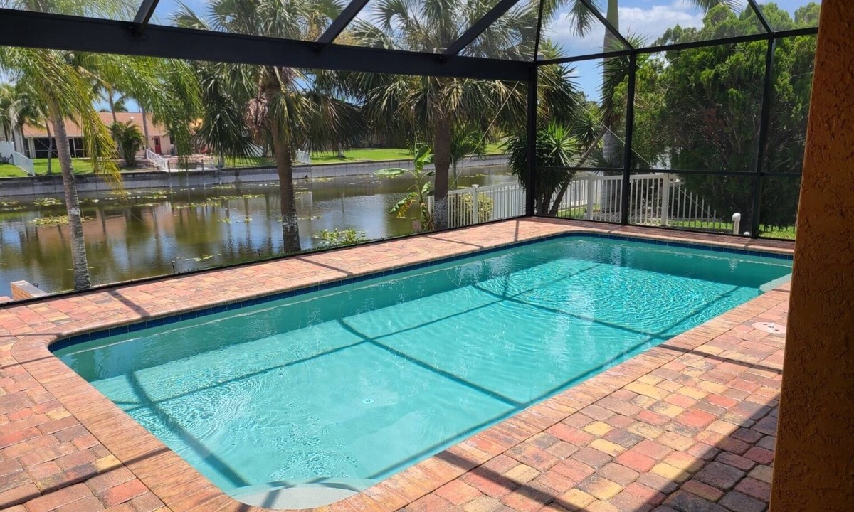Cape Coral House | Incredible Lanai w/Heated, Salt Pool, Extra-Wide Canal View, Southern Exposure!