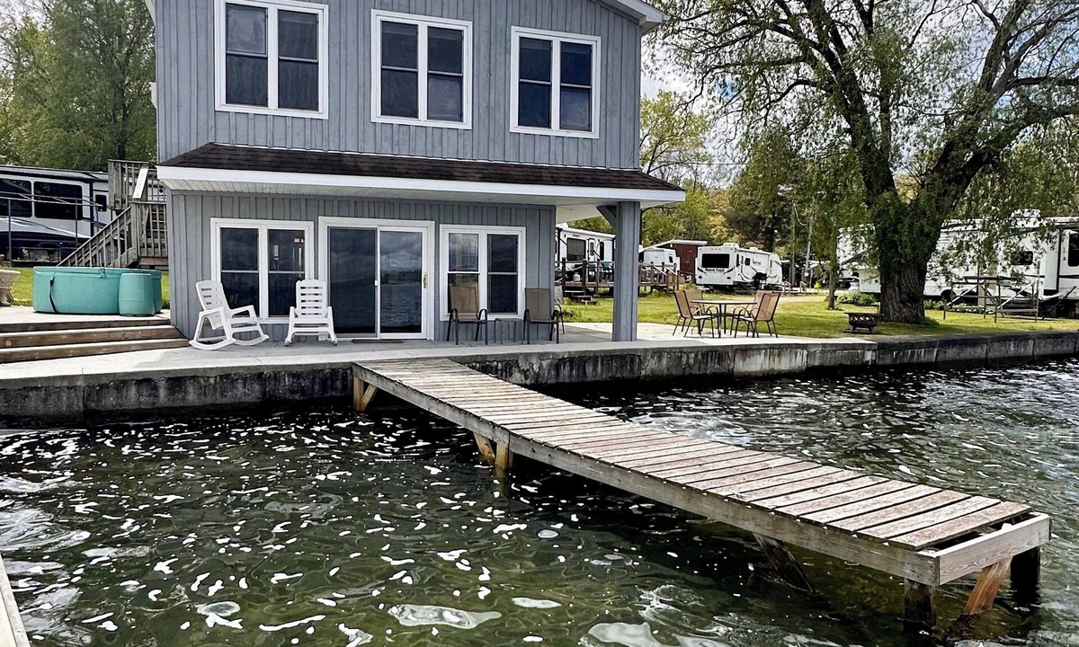 Castile House | Lakefront Cottage with Stunning Views. Boat available to rent with cottage!