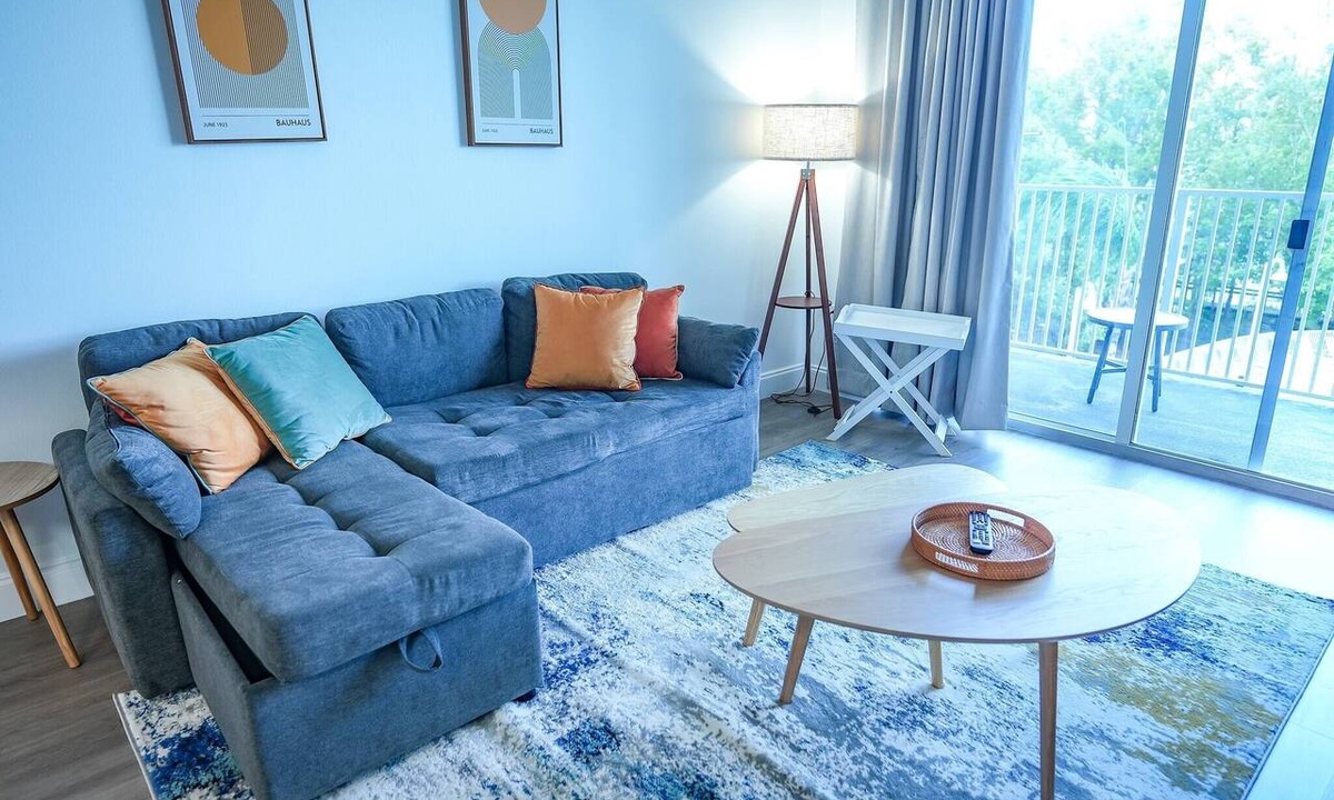 Florida Central Atlantic Coast Apartment | Lakefront resort condo w/balcony, pool, jacuzzi & arcade fun!