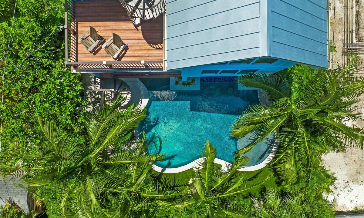 Sarasota House | Lido Key Family Home with Waterslide & Rooftop Views Steps to Beach -Vitamin Sea