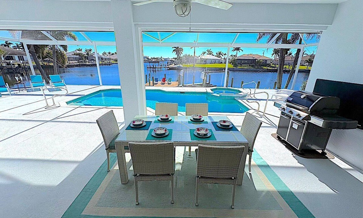 Pelican House | Michaela 1059 Gulf Access 3BR Heated Pool/Spa and Large Dock with Tiki, Kayaks Included