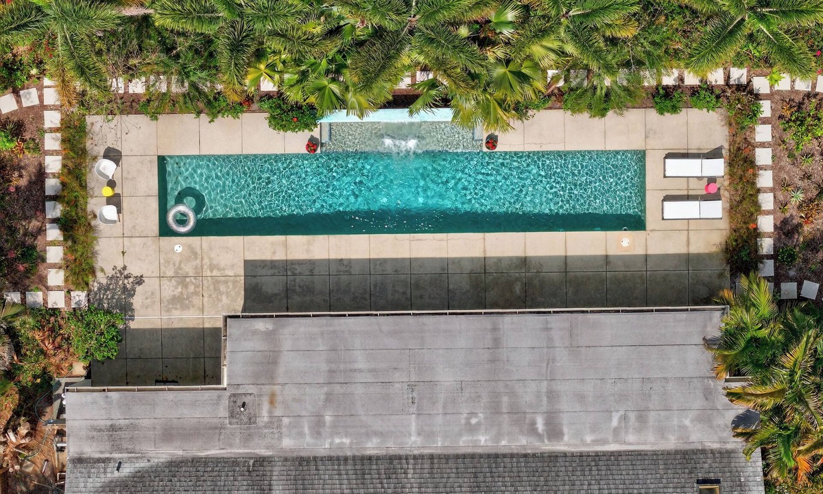 South Sarasota House | Mid-Century Modern W/Private Lap Pool In secluded Garden and art studio