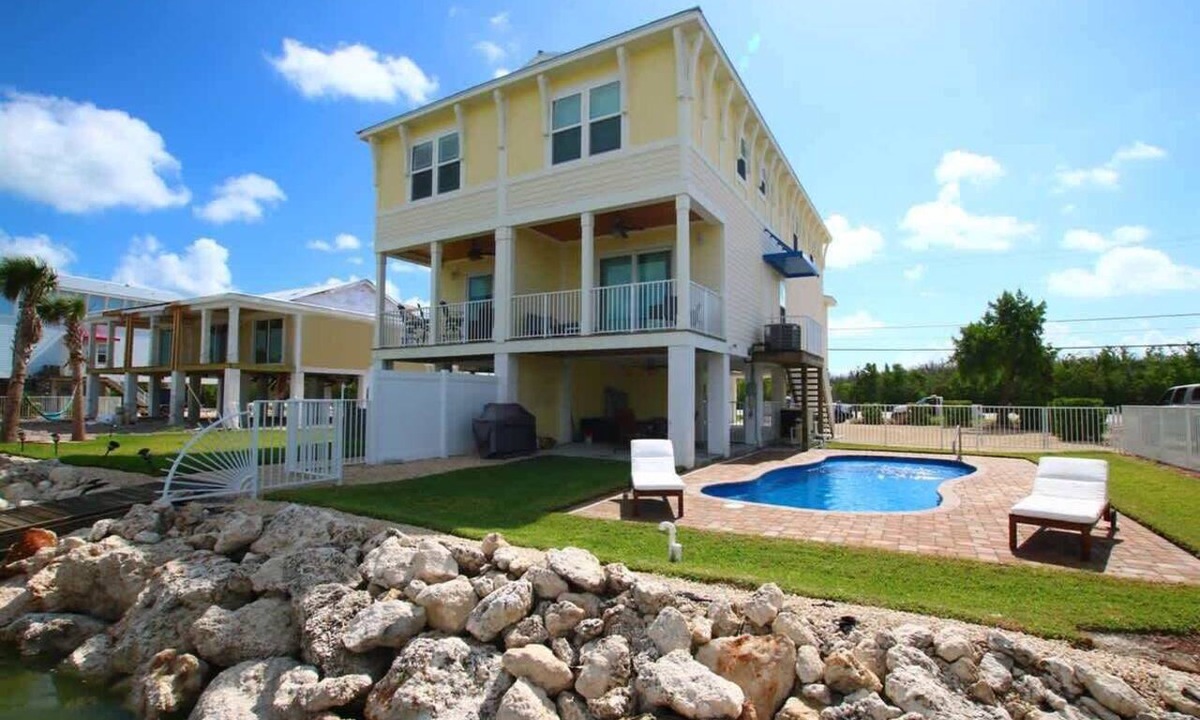 Marathon House | Modern Coastal 4BR| half-duplex near sombrero beach | Sleeps 10 w/Pool & Private Dock