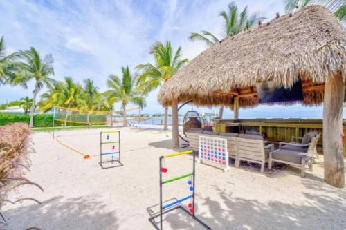 Marathon Villa | Paradise Point Pet friendly Oceanfront Luxury vacation rental with pool, dock and outdoor kitchen