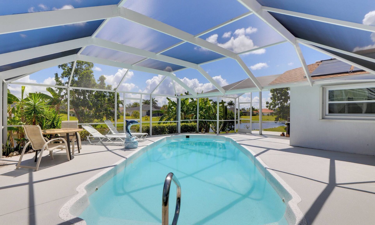 Long Meadow House | Patio & Grill! Canalfront Rotonda West Golf Escape
