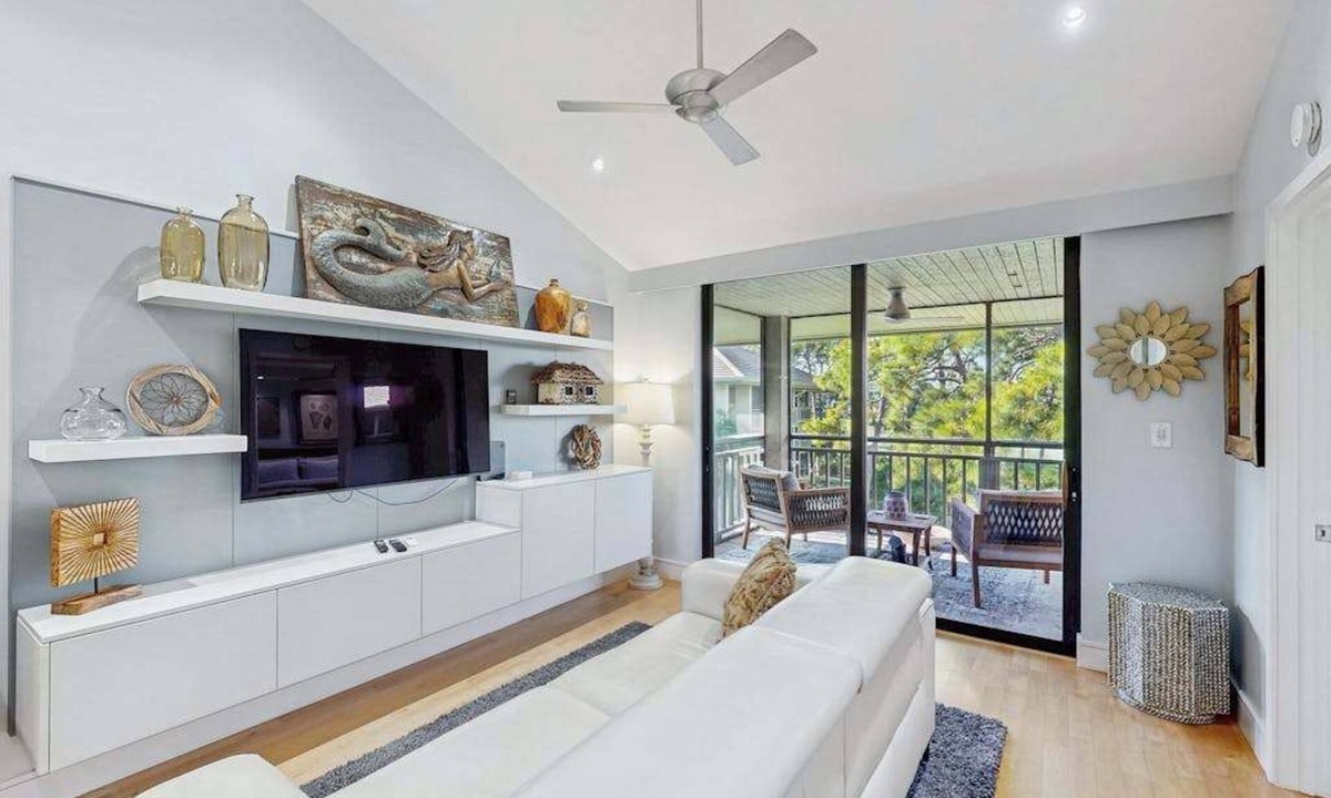 Bonita Bay Condo | Peaceful top floor condo with golf views and resort amenities
