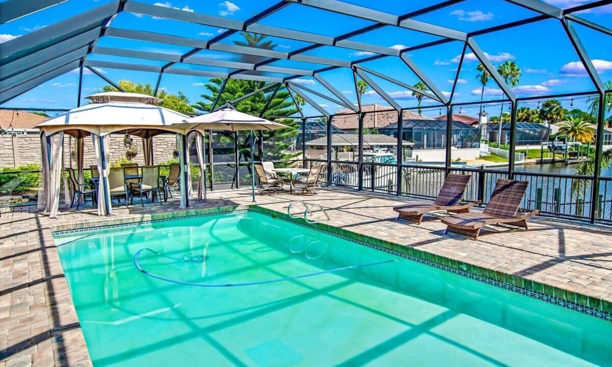 Palm Harbor House | Private Corner Oasis with Heated Saltwater Pool