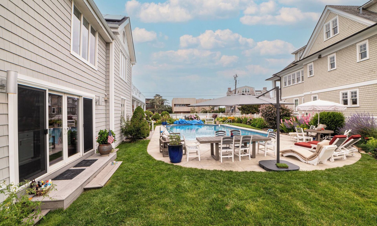 Gardens House | Private heated pool, Pet friendly, Walk to beach and boardwalk! Garden Oasis!