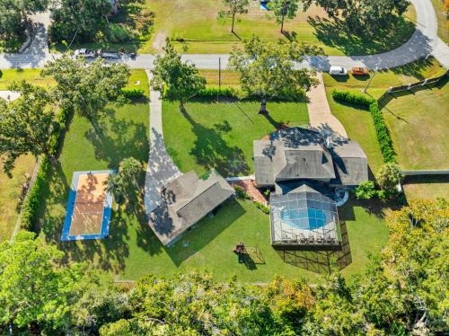 Westchase House | Private Pool Pickleball Game Room Sleeps 18