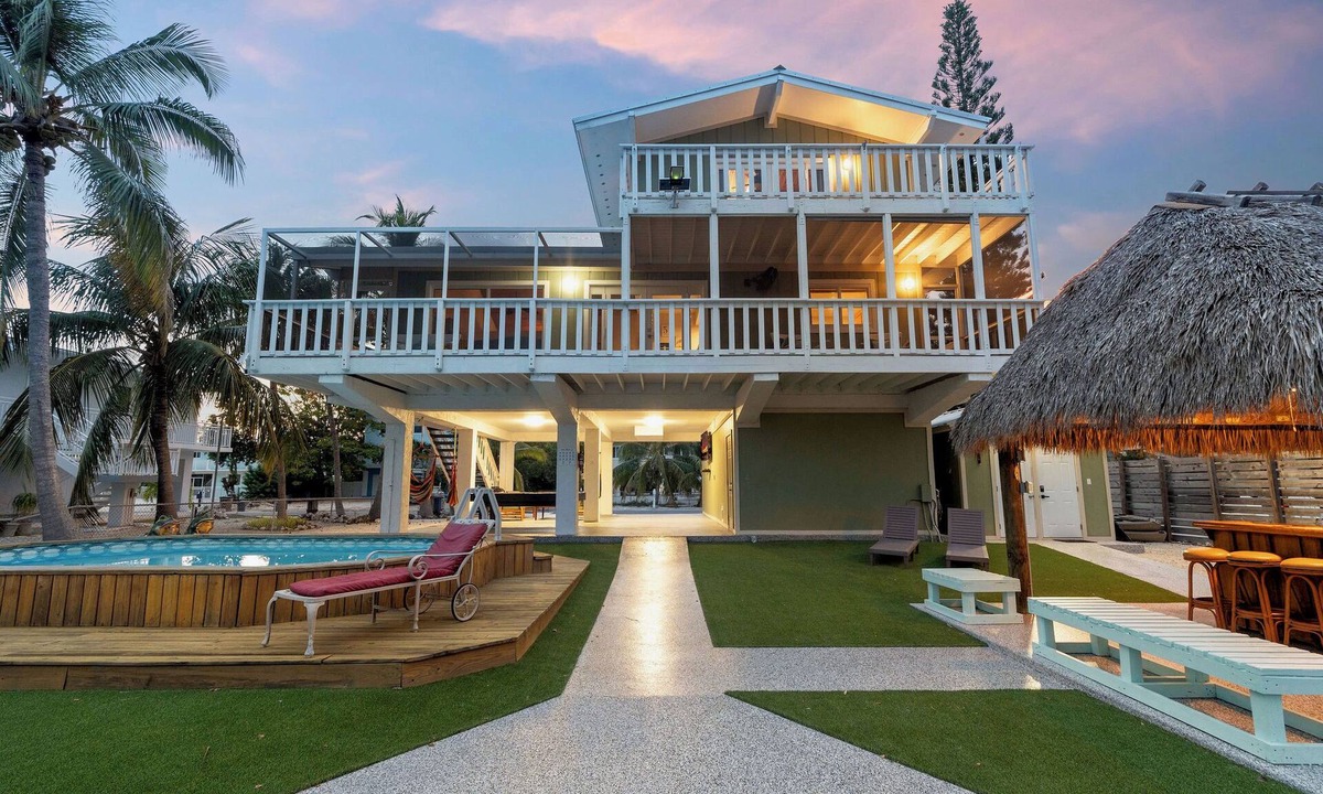 Twin Lakes House | Reel Paradise in Key Largo - 4 bed 3.5 bath, pool, outdoor kitchen, and dock.