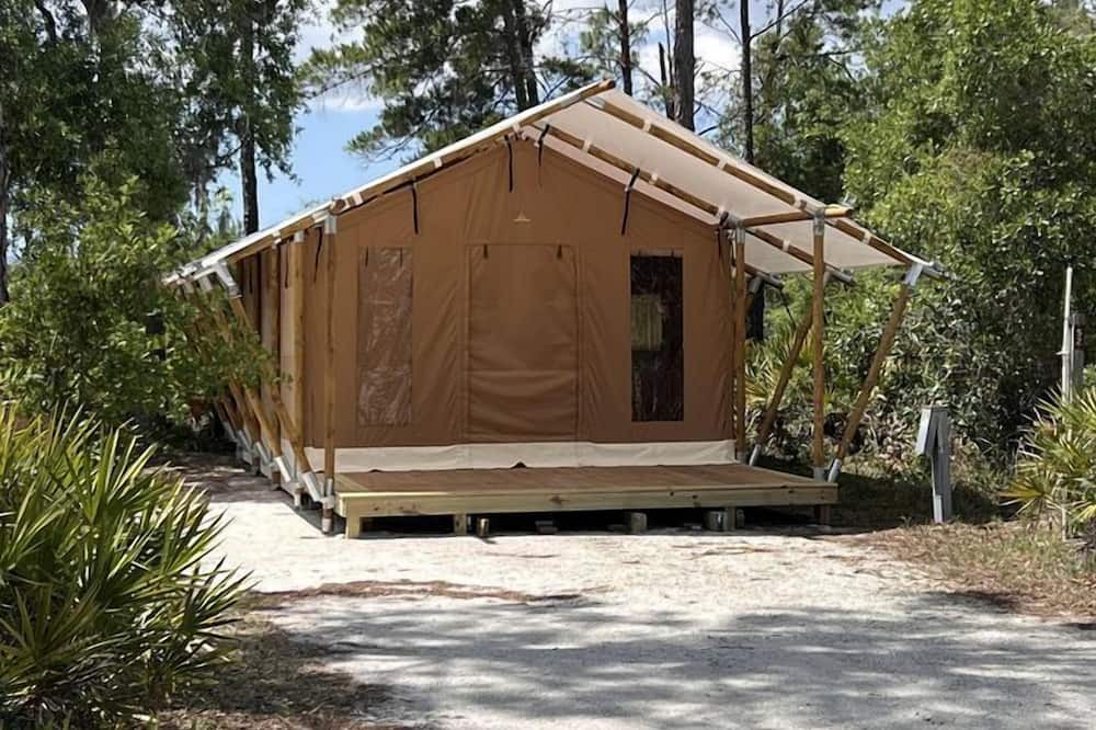Braden River RV Rental | Relaxing Safari Tent with Fire Pit Near Anna Maria Island in Bradenton, Florida
