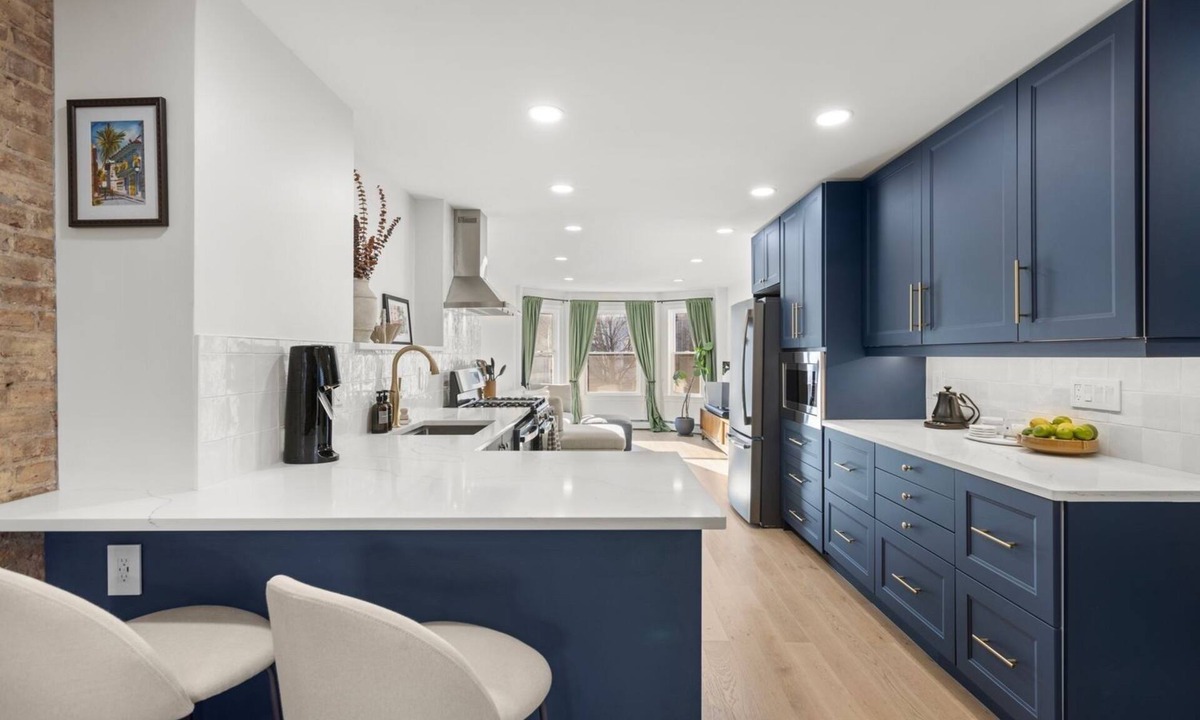 The Village House | Renovated townhome in Downtown Jersey City w Backyard patio