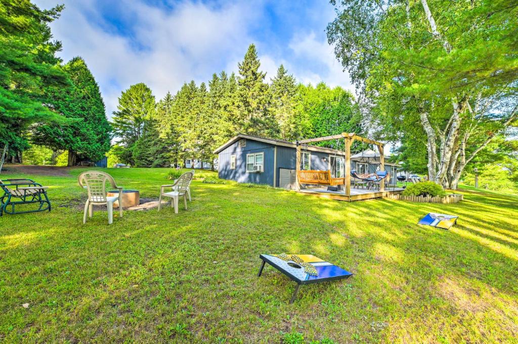 Cheboygan House | Riverfront Home w/Dock ~ 6 Mi to Cheboygan!