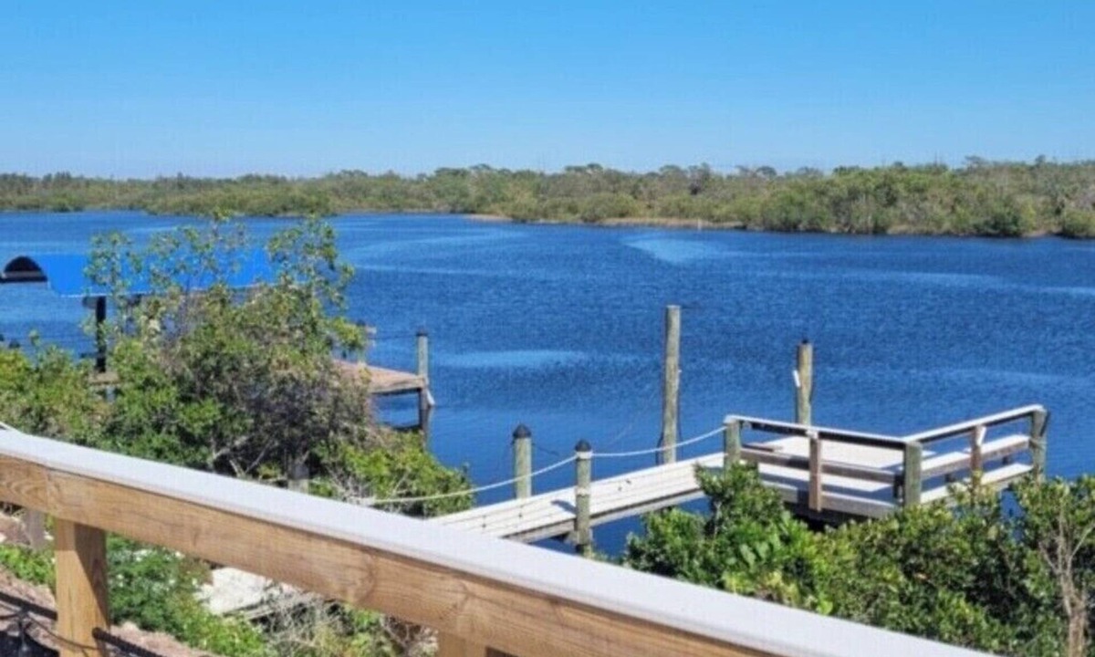 Southside Rural Community House | Riverside Oasis - Dock - Shuffleboard