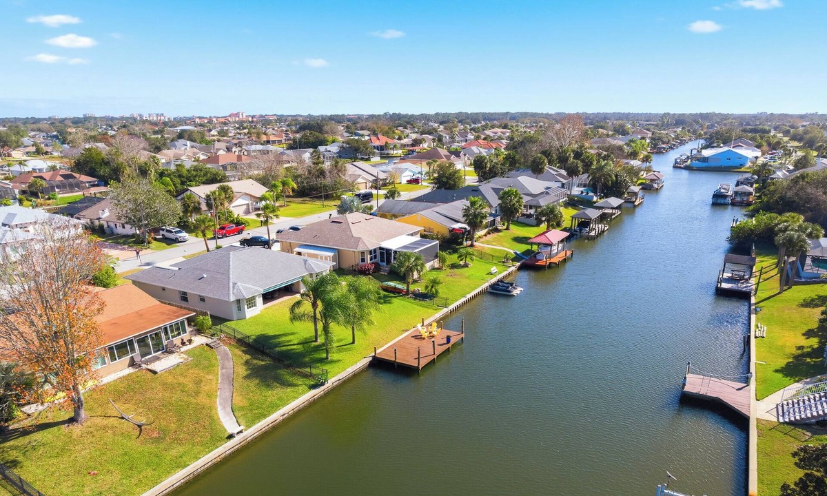 Palm Harbor House | Salt Water Canal Home in Palm Coast, FL, Boat Dock, Kayaks, Game Room, Bikes