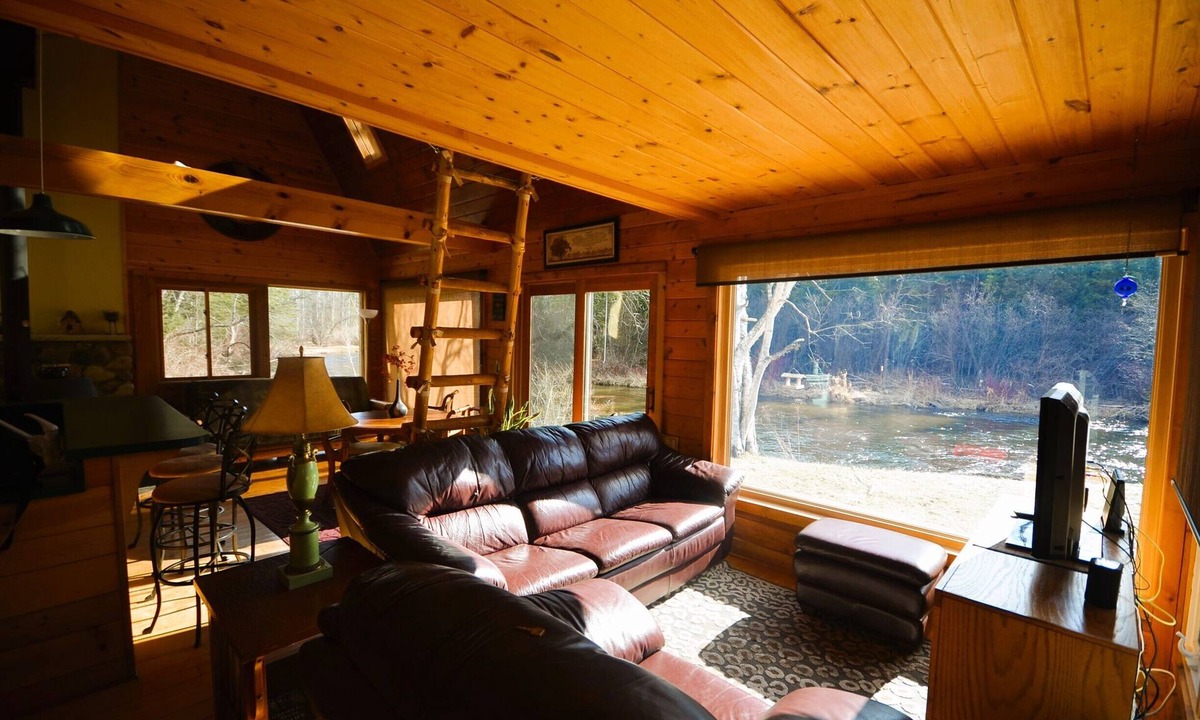 Mayfield House | Secluded Boardman River home with a HOT TUB, Smart TV, Kayaks. Dogs ok