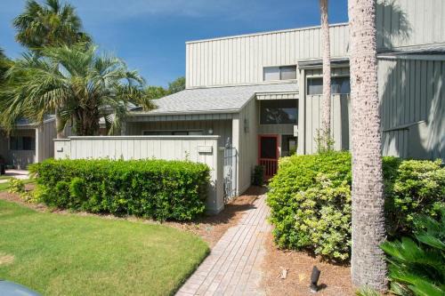 Sawgrass House | Shady Palms - 2BR Retreat w Pool & Beach Access