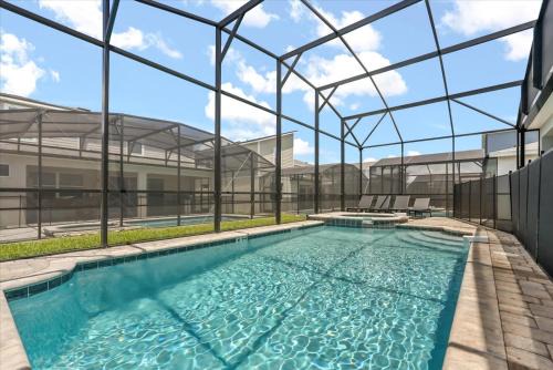 Florida Central Atlantic Coast House | Solara Resort Themed Pool And Cinema Home