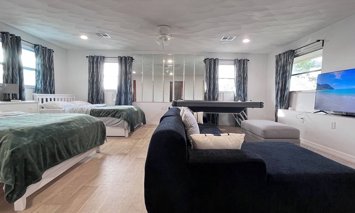 Chandler Park House | Spacious 5-bedroom pool house in Cape Canaveral with air hockey WiFi, AC