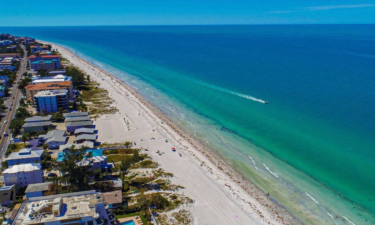 Indian Shores Condo | Spacious and family friendly with pool dock and just steps to the beaches