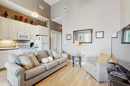 Gulf Place Apartment | Spacious condo with large living area private balcony & shared pool