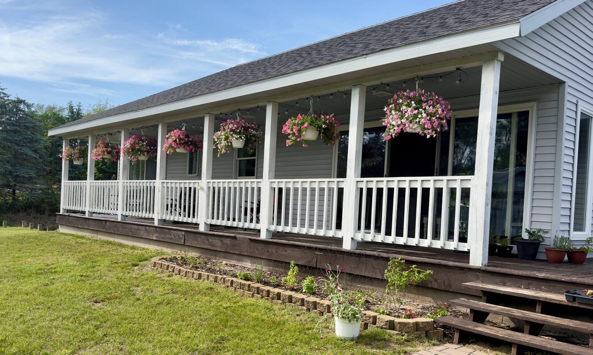Ferrysburg House | Spring Lake waterfront home on Markers Cove with full Spring Lake access!