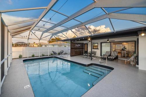 Port Charlotte House | Stylish coastal retreat with Heated Saltwater pool