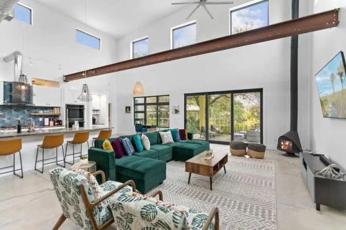 Butler Beach House | Swim & Dock in Style Art Deco Beach Escape