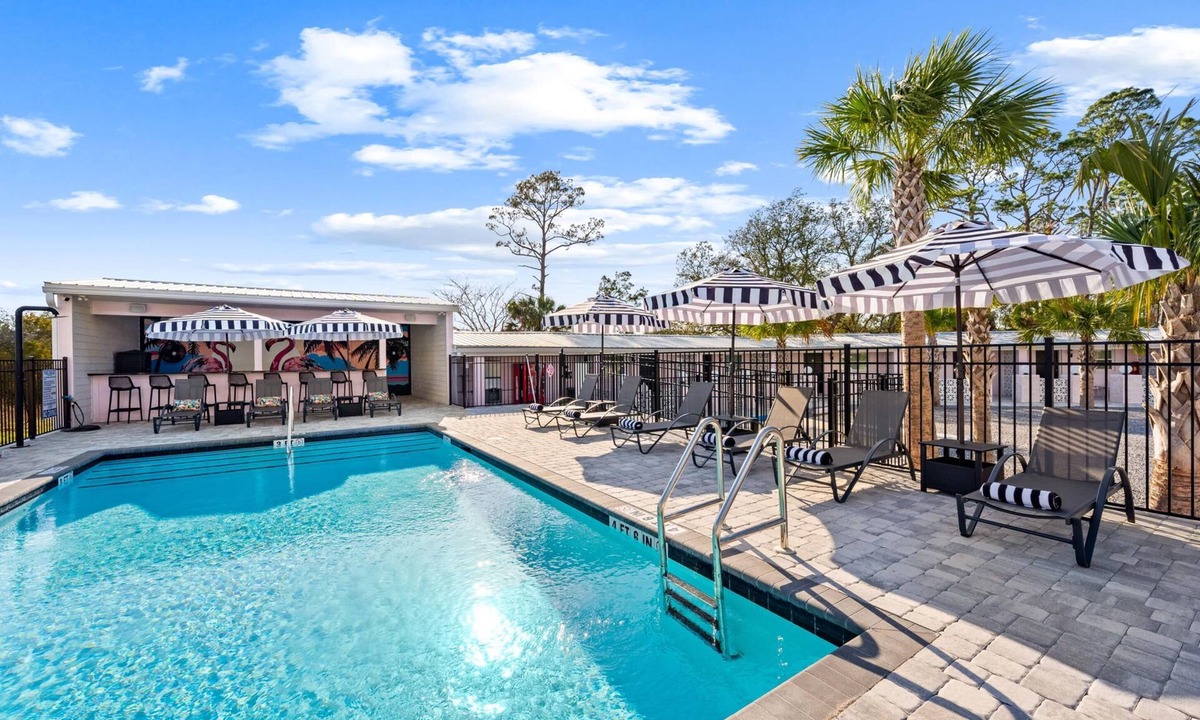 Port St. Joe Condo | The Pink Flamingo - Private Boutique Motel, Heated Pool, Sleeps 28, Near Beach!