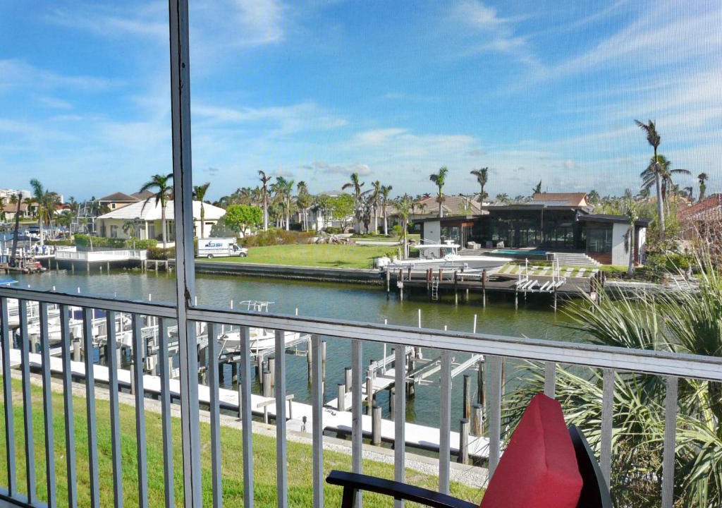 Marco Island House | Tranquil waterfront condo with pool and steps to beach