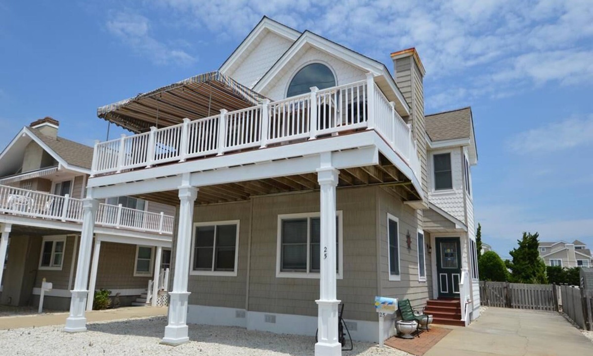 Avalon House | Vacation by the beach and enjoy the private backyard pool. Pets considered, too.