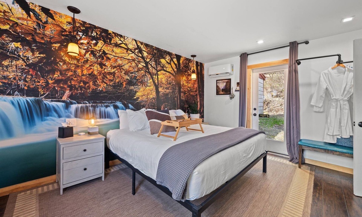 Hancock Hotel | Waterfall Retreat | Serene Room with Forest Mural at Green Acres Retreat